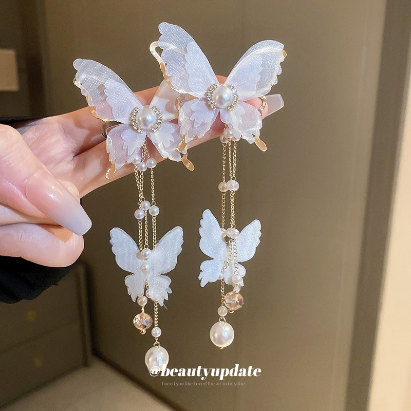 Pendientes de perlas de diamantes de aguja de plata Pendientes de verano chica Super Fairy Butterfly borla pendientes en línea celebridad ins pendientes