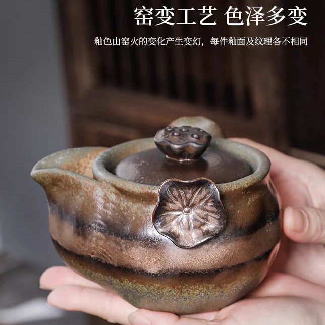 Transfronterizos de madera de bronce esmalte tetera de cerámica tetera botella de oro mano agarrar tetera retrógrada casera hecha a mano kung fu té
