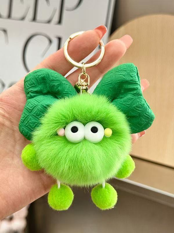 Nuevo estilo creativo imitación piel de conejo celebridad de Internet bowknot pequeña bola de carbón colgante niña corazón mochila escolar decoración coche llavero mujer