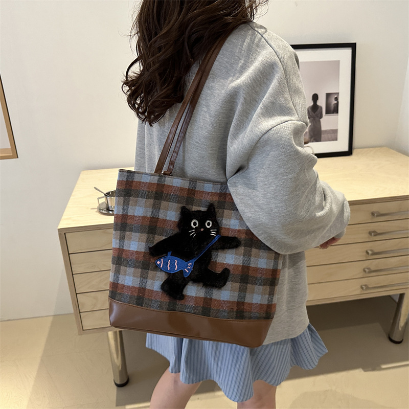 Gran capacidad de alta sensación de bolso de mujer 2024, nuevo bolso de tela de tela, mochila de moda