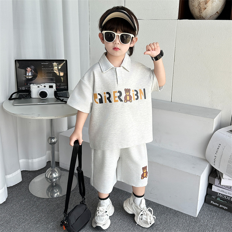 7346 Traje de verano para niños casual de manga corta con cuello POLO 2025 Pantalones cortos de calle fritos para niños Traje de dos piezas para bebés
