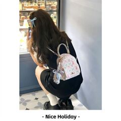 夏天超火印花精致双肩包包女2025新款高级感小众背包女通勤小背包