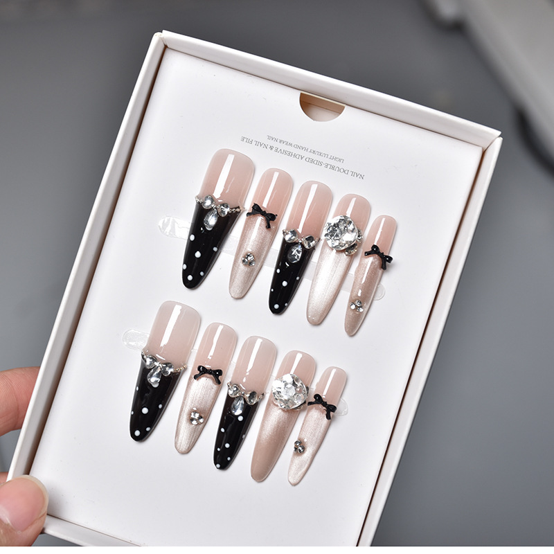 2026 otoño y invierno nuevo perro largo 4.0 manicure manicure fabricantes de productos terminados lotes negros de uñas adorables puntos de onda