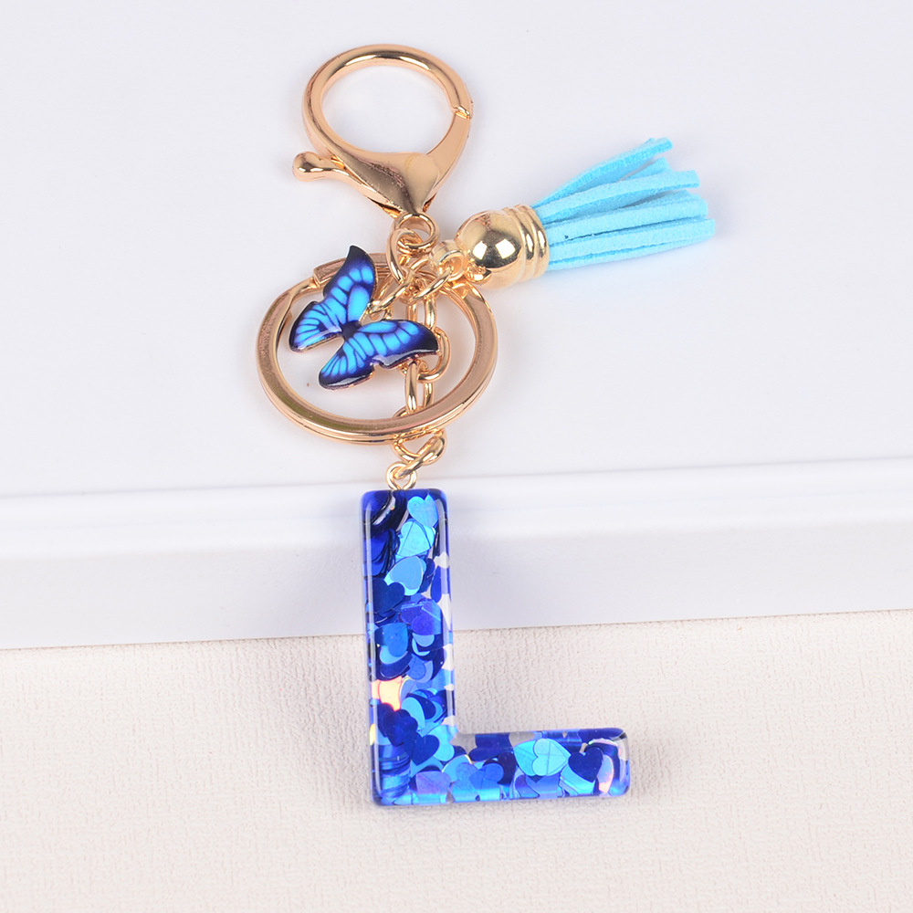 Cross-border Hot Sale 26 letras inglesas llavero de resina de goteo de goma esquinilla llavero de letras de amor personalizado