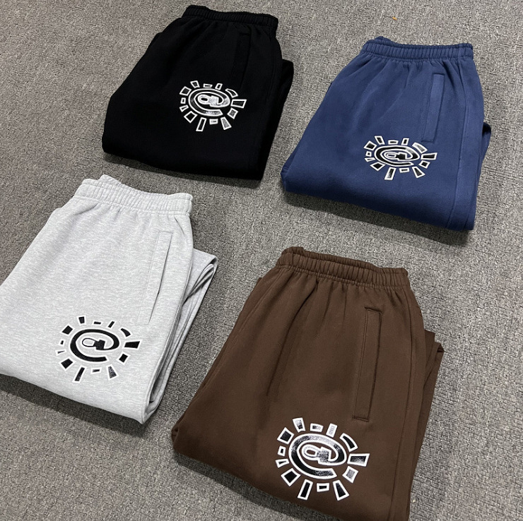 Pantalones de marca de moda transfronterizos pantalones deportivos impresos pareja retro callejera hip-hop callejera relajada pantalones casuales de moda