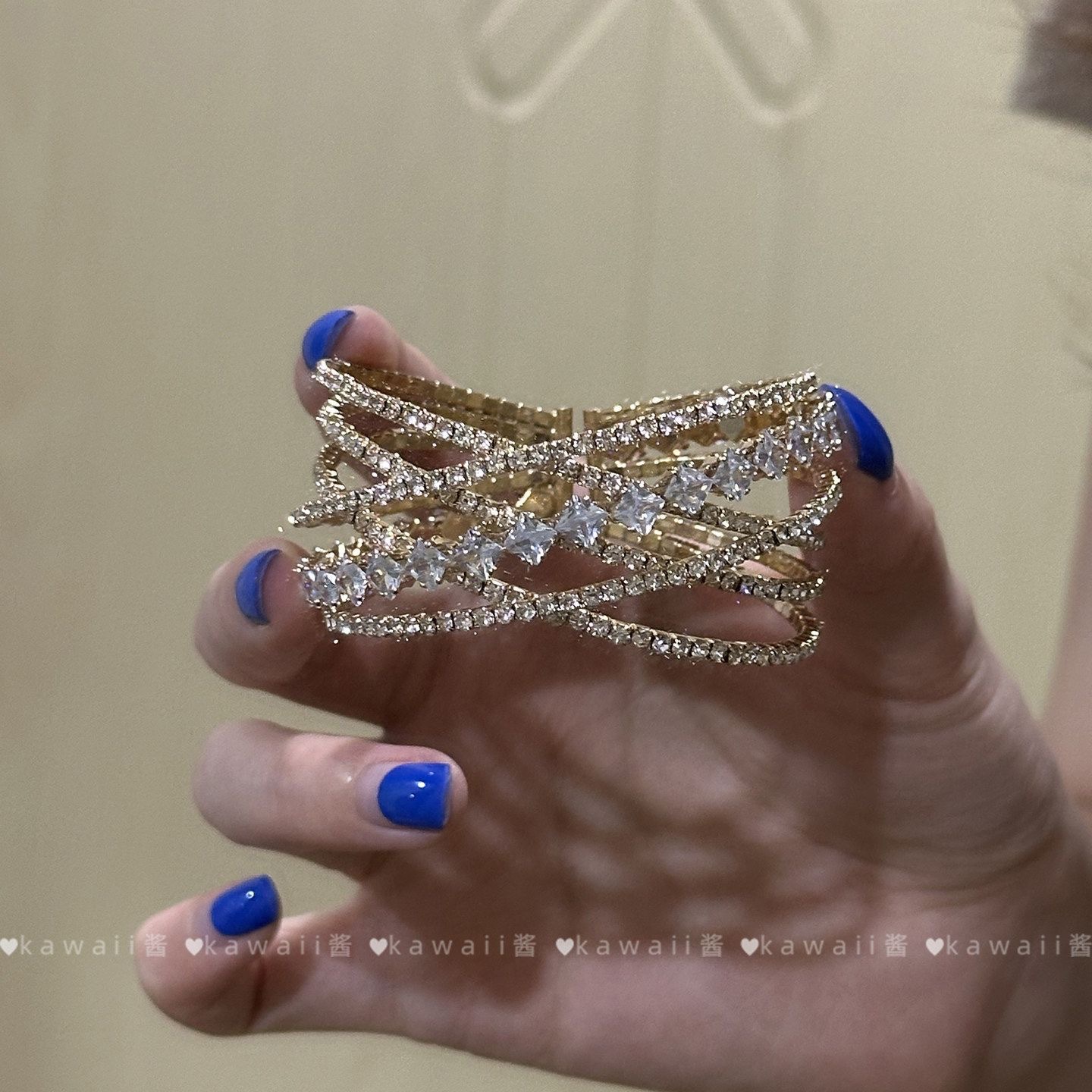 Golden bracelet with zircon, diamond encrusted
