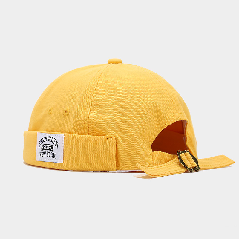 Sombrero de mujer de Moda de Primavera nuevo sombrero de melón retro sin ala estilo coreano versátil sombrero de piso de los hombres de la calle hip hop yuppie sombrero