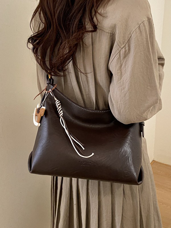 Alta sensación de gran capacidad de viaje bolsa de mano para mujeres Europa y América textura nicho de moda simple universal bolsa de hombro