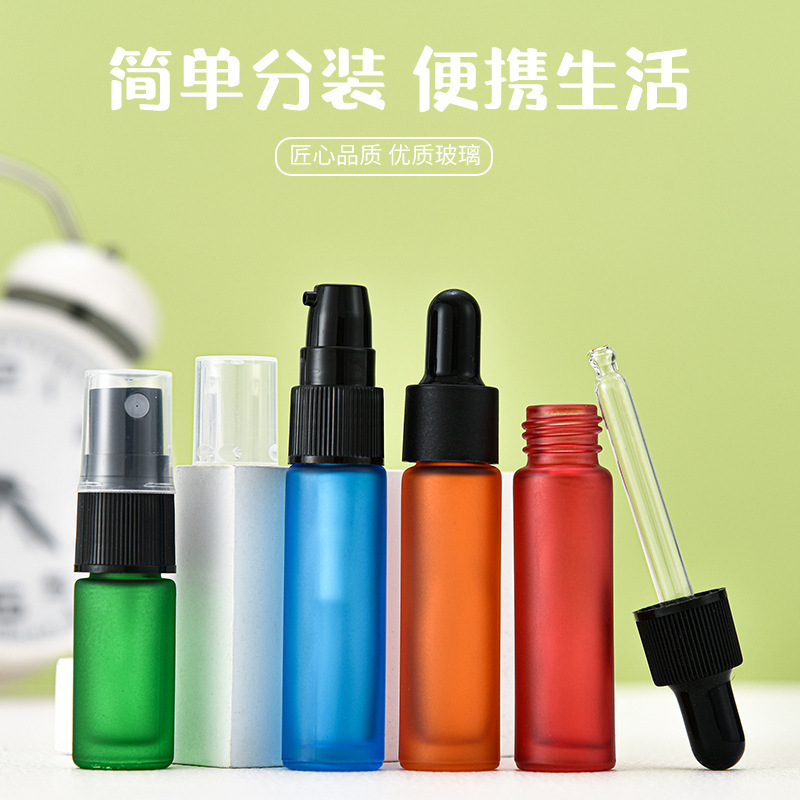 Venta al por mayor de 10ml botella de bolas de vidrio de colores botella de bolas mate y protegida de la luz botella de spray de perfume de 5ml botella de aceite esencial