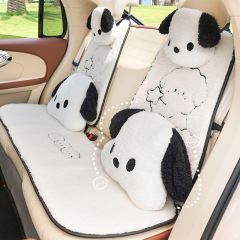 車の座布団の羊の小毛の漫画の刺繍の車用の滑り止めの保温のシートクッションのアイデアの白黒の犬の車のシートカバー