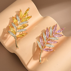 Korean-style Fashion Olive Branch Brooch for Women | Elegant Crystal-Imitated Decorative Pin | Creative Design for Coats, Jackets, and Clothing | Versatile Accessories