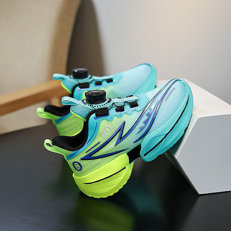 Fábrica directa al aire libre zapatos para niños botón rotativo antideslizante respirable malla primavera zapatos para correr al por mayor