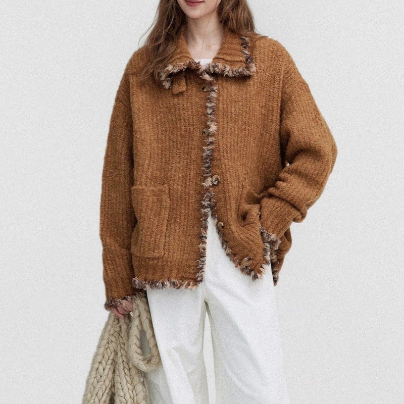 Korean-style pumpkin-colored knitted cardigan with a lapel collar, a new autumn/winter design featuring intricate fringed detailing, a loose-fitting women's sweater for stylish outfits