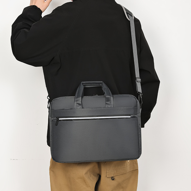 Wholesale of lightweight laptop bags for cross-border sales, including business-friendly and portable tote bags, as well as high-end business commuter crossbody bags with inner linings
