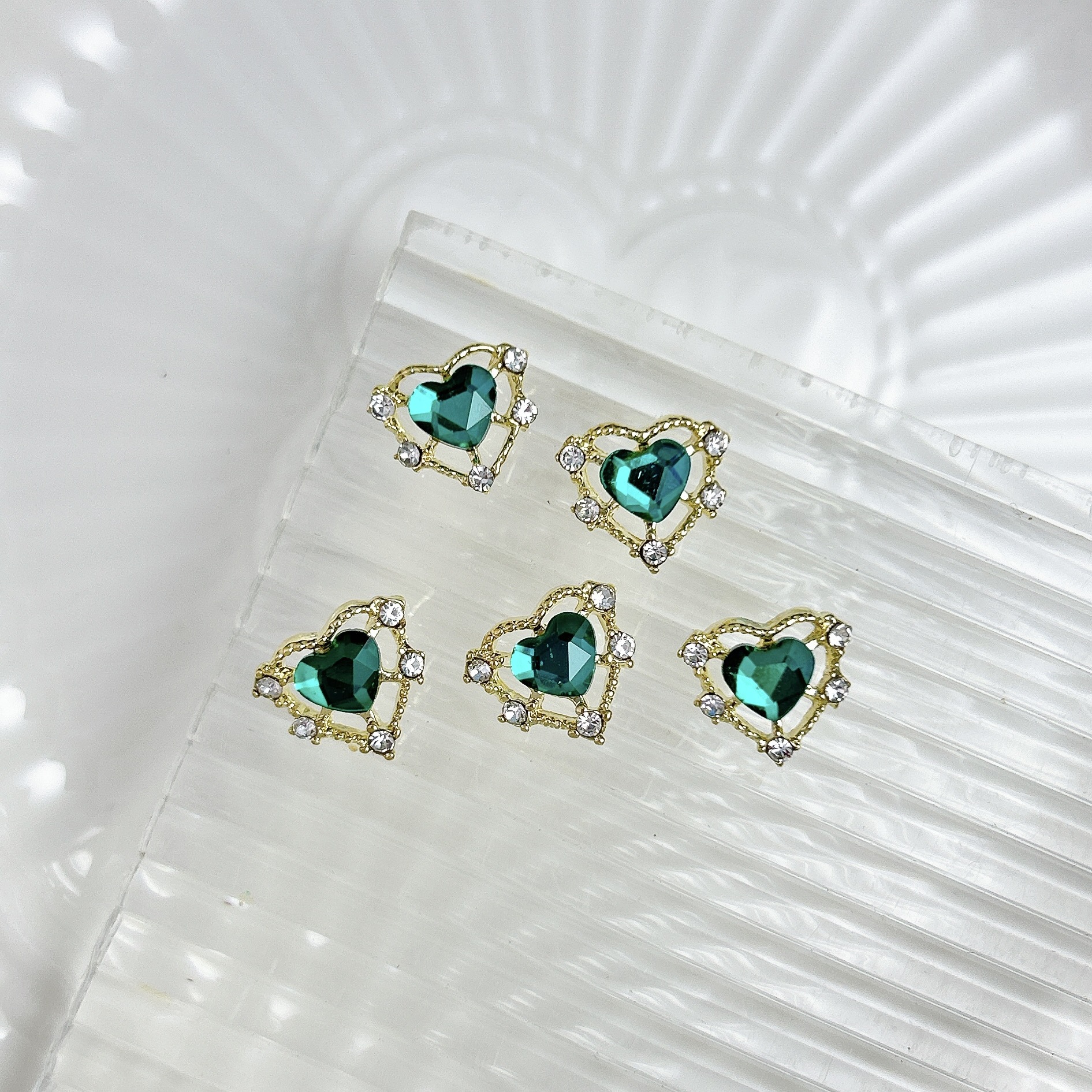 Nueva aleación china joyas de manicura taladro explosión grasa flash Fang amor gota de agua XiFeiYuan la misma armadura de la corte con taladro