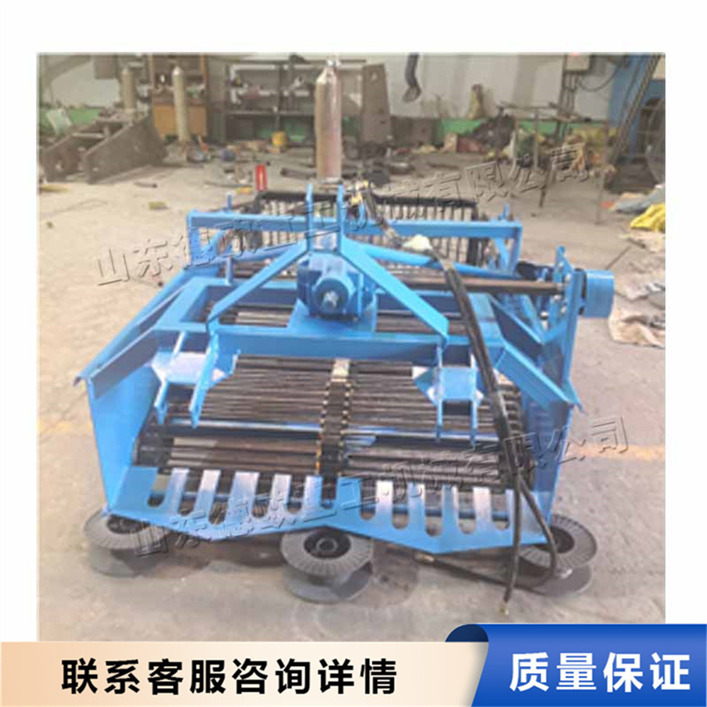 拖拉机牵引式农田捡石头机田间管理碎石收集机土壤筛石自动装车机