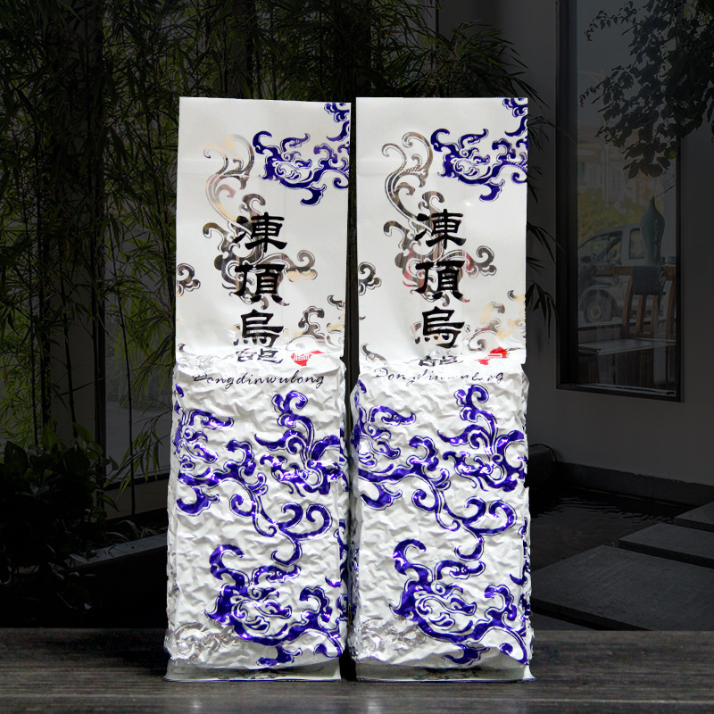 Alpine Oolong tea Oolong tea Golden Xuan particles loose tea tea fragrant milk tea bagged tea factory wholesale