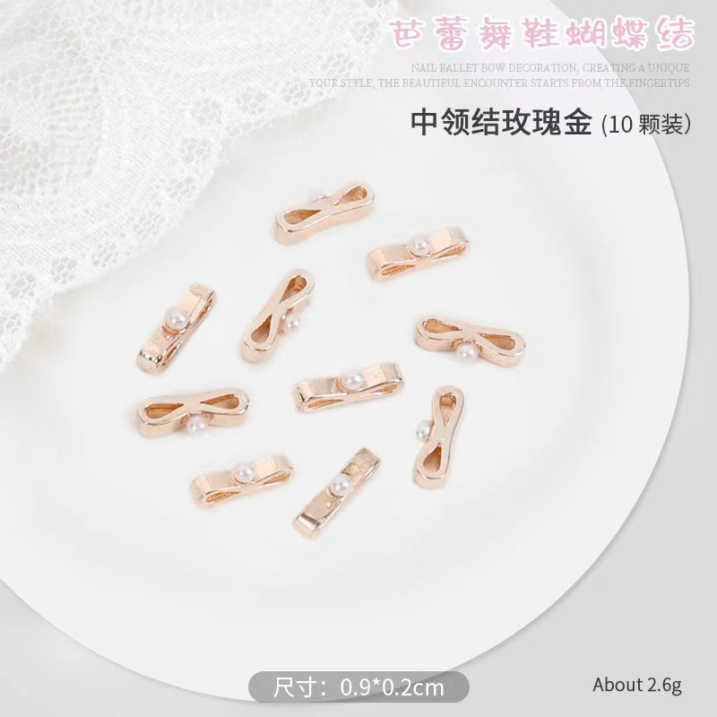 Pequeño libro rojo explosión zapatos de ballet arco flotante joyería de manicura corbata tridimensional 10 paquetes de aleación