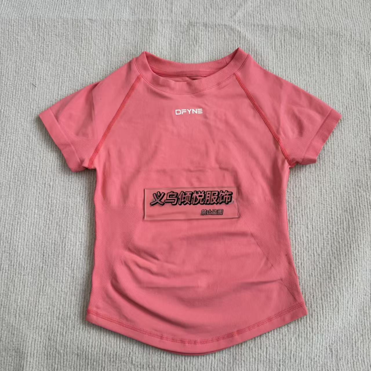 Aliexpress nuevo DFYNE mangas cortas mate nylon alta elástica cuerpo apretado sin bordas de acondicionamiento deportivo T mangas cortas