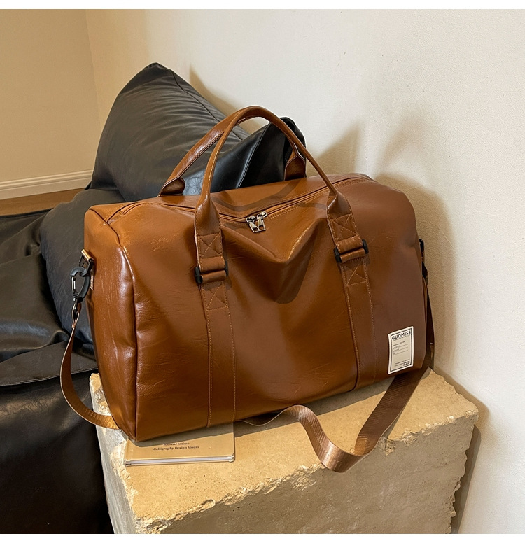 Men's high-end travel bag, large-capacity sports and fitness bag, women's leather travel clothes, luggage bag for men undefined