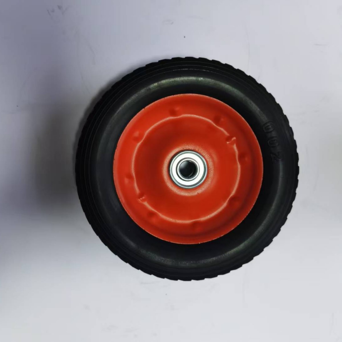 Fábrica directa de 8,5 pulgadas naranja rojo radios de hierro césped de goma sólida herramientas industriales ruedas de gran precio