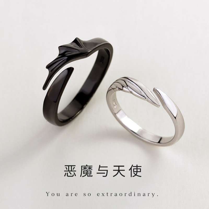 Demon and Angel lovers ring trend refers to men and women a pair of open ring fashion simple black and white wings ring