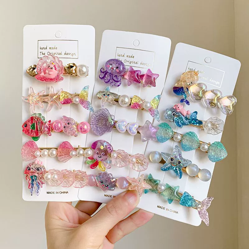 ชุดกิ๊บติดผมเด็ก 5 ชิ้น อุปกรณ์ทรงผมการ์ตูนหลายสี ขนาด 17.5×8 ซม.