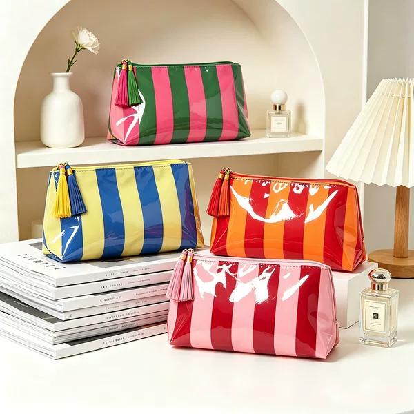 2026PVC striped makeup bag with tassels and zipper, waterproof travel toiletry bag, compact and portable