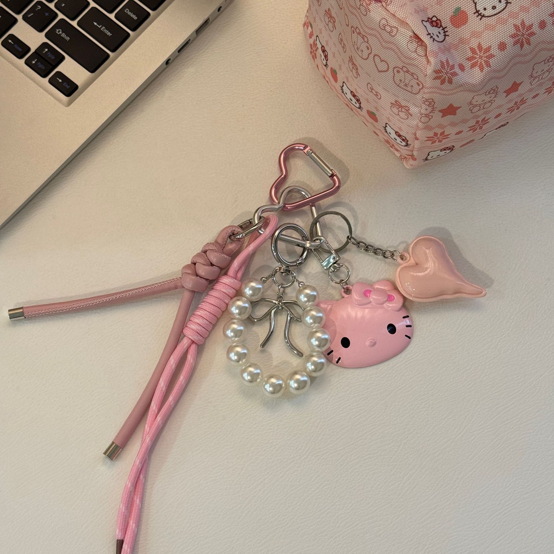 Original DIY hecha a mano colgante rosa KT gato personalidad bolso colgante Miu pareja trenzado colgante bolso colgante