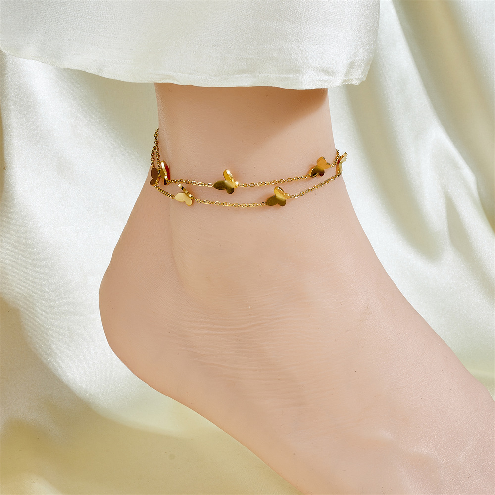 Cientos de tobilleras, tobilleras de lujo simples y ligeras, sentido femenino, accesorios de celebridades de Internet, temperamento de moda dorado de 18 quilates, cadena de pie de acero de titanio sexy