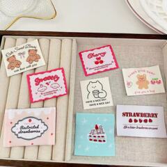 韓系布標の手作り補助材料のケースの腸の輪の刺繍は熊の犬のイチゴのさくらんぼの服装の部品を編みます。