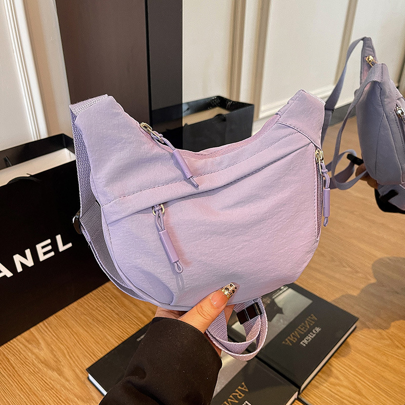 Bolsa de hombro deportiva casual coreana para hombres y mujeres, bolsas de bolsas de bolsas para niños de color sólido.