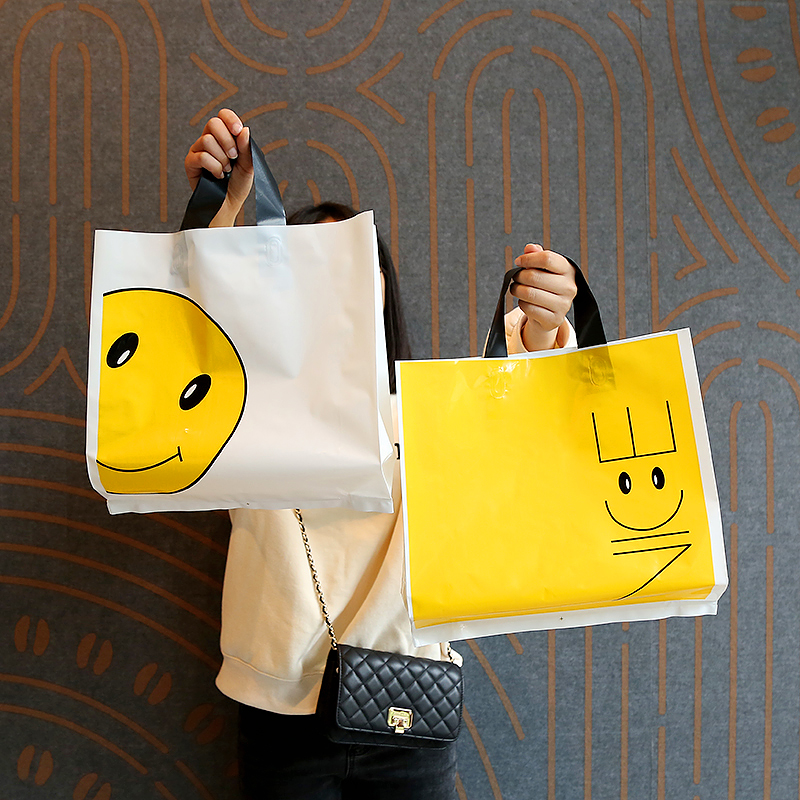 Bolsas de regalo de plástico personalizadas impresión logotipo bolsas de ropa personalizadas bolsas de goma de compras ropa de mujer portátil