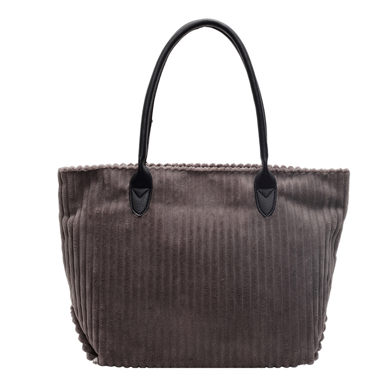 Bolso de terciopelo a rayas de gran capacidad para mujer 2024 otoño e invierno nuevo bolso de compras de un solo hombro de todo fósforo bolso de viaje de clase de todo fósforo