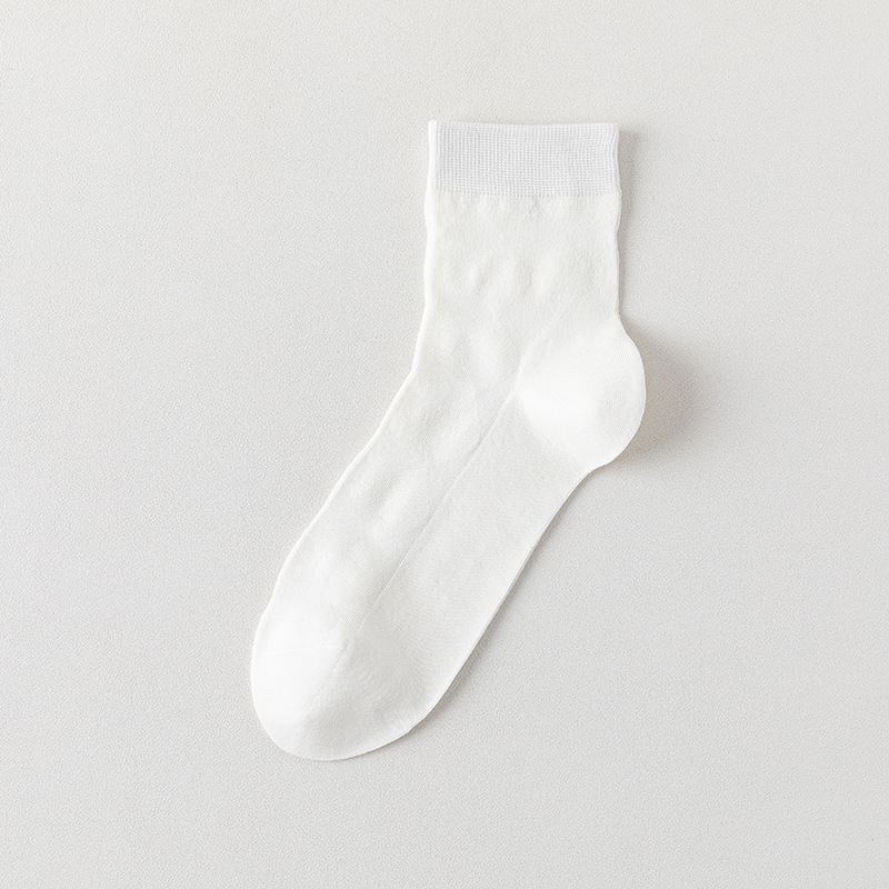 Calcetines de algodón de color sólido para hombres primavera y otoño medio tubo de diamante sin hueso transpirable absorción de sudor embalaje independiente calcetines de hombre al por mayor