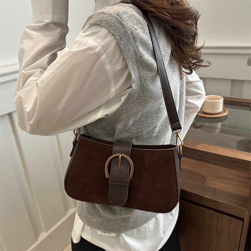 Bolso retro esmerilado para mujeres 2025 verano nueva moda moda de un hombro mochila textura simple bolso de palo