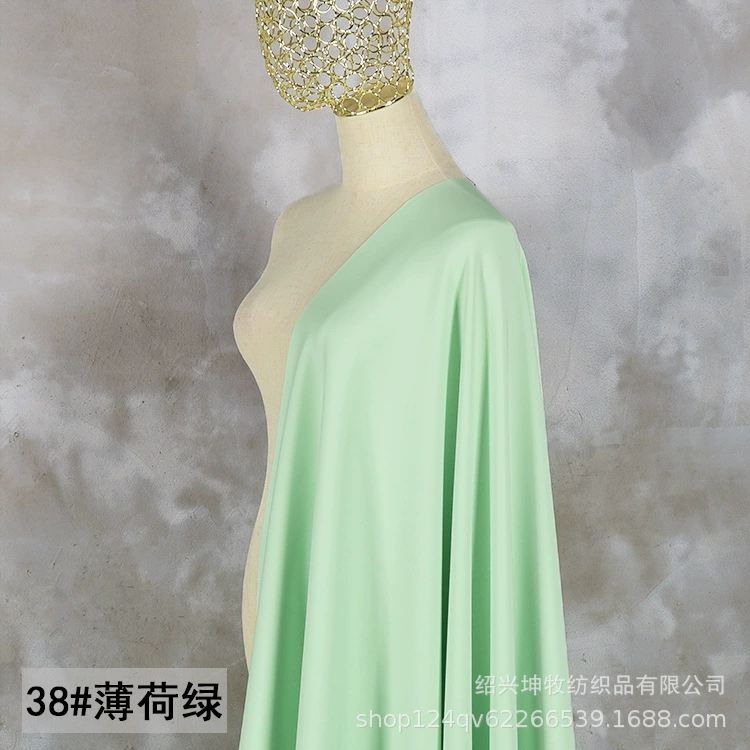 Ice porcelain air layer is cold, smooth solid space cotton cloth knitting four -sided elastic clothing design fabric