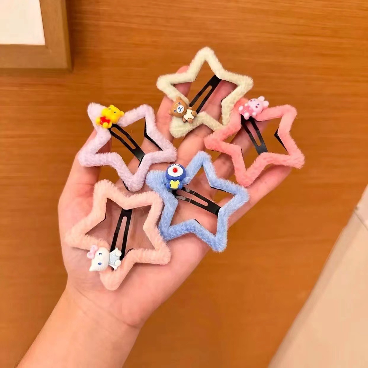 Otoño e invierno nuevos niños de dibujos animados estrella de cinco puntas de felpa horquilla Bangs clip lateral linda chica estrella horquilla rota
