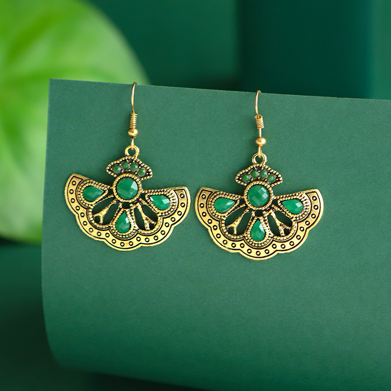 Fashion Hollow Fan-shaped Peacock Geometric Drop Earrings Wholesale display picture 2