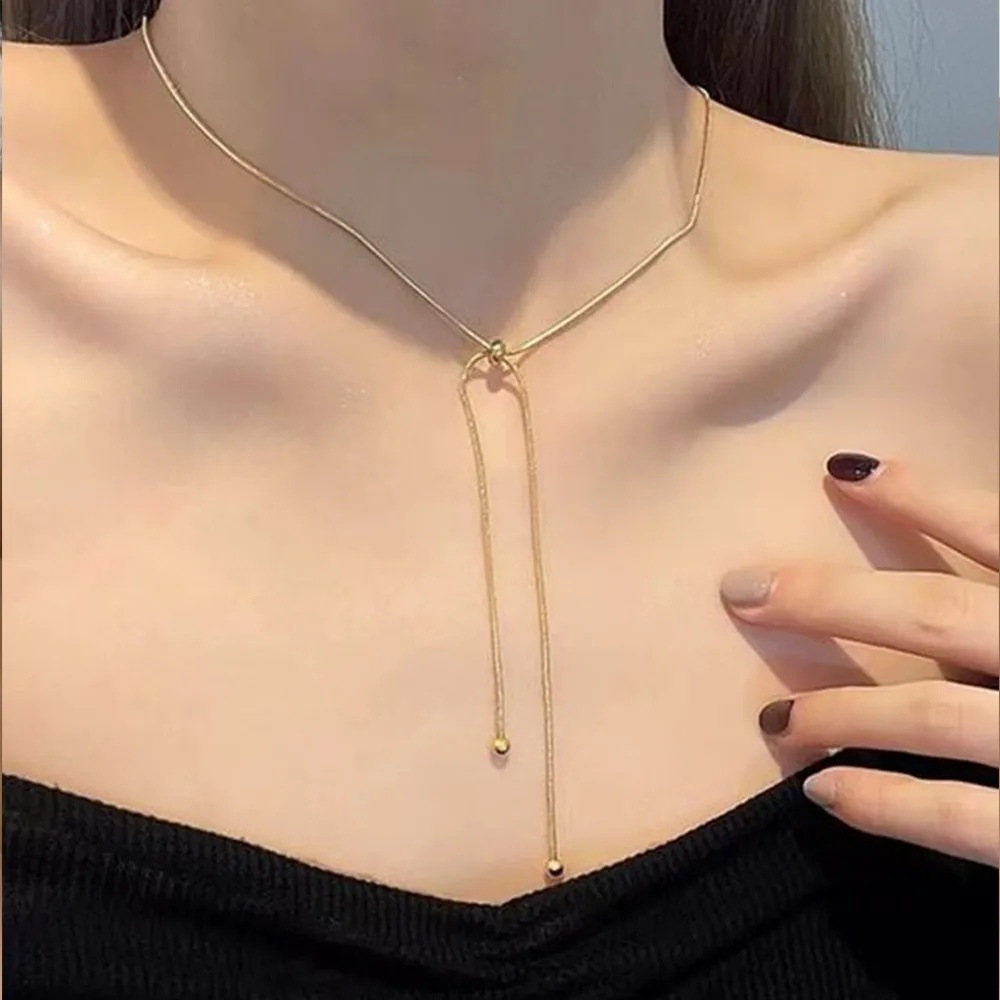 Coreano simple pulsera de tracción de hueso de serpiente ajustable corta y larga pulsera de tobillas de chicas estudiantes en el conjunto de collar de tobillas