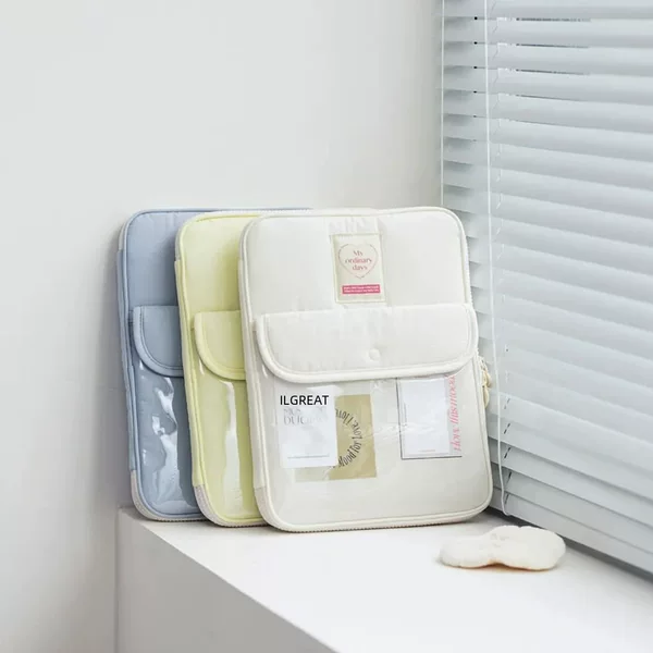South Korea's new The m **dle st** io11/13 inch iPad snap pocket tablet bag storage bag