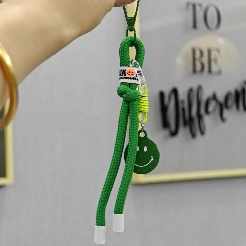 Sonriente cuerda de trenzado llaves de coche bolsos colgantes bolsos accesorios de ropa en caso de teléfono móvil cuerda de color