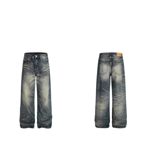 Vintage punk-style straight-leg, low-rise, slightly flared denim trousers with embroidery and a flowing, relaxed fit.