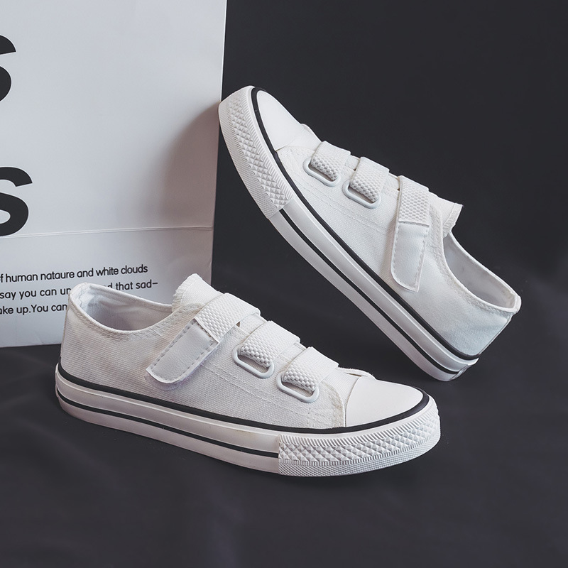 Zapatos de lona bajos de estilo coreano para mujer 2024 Primavera Nueva hebilla zapatos blancos mocasines para estudiantes zapatos de goma vulcanizada zapatos de tela