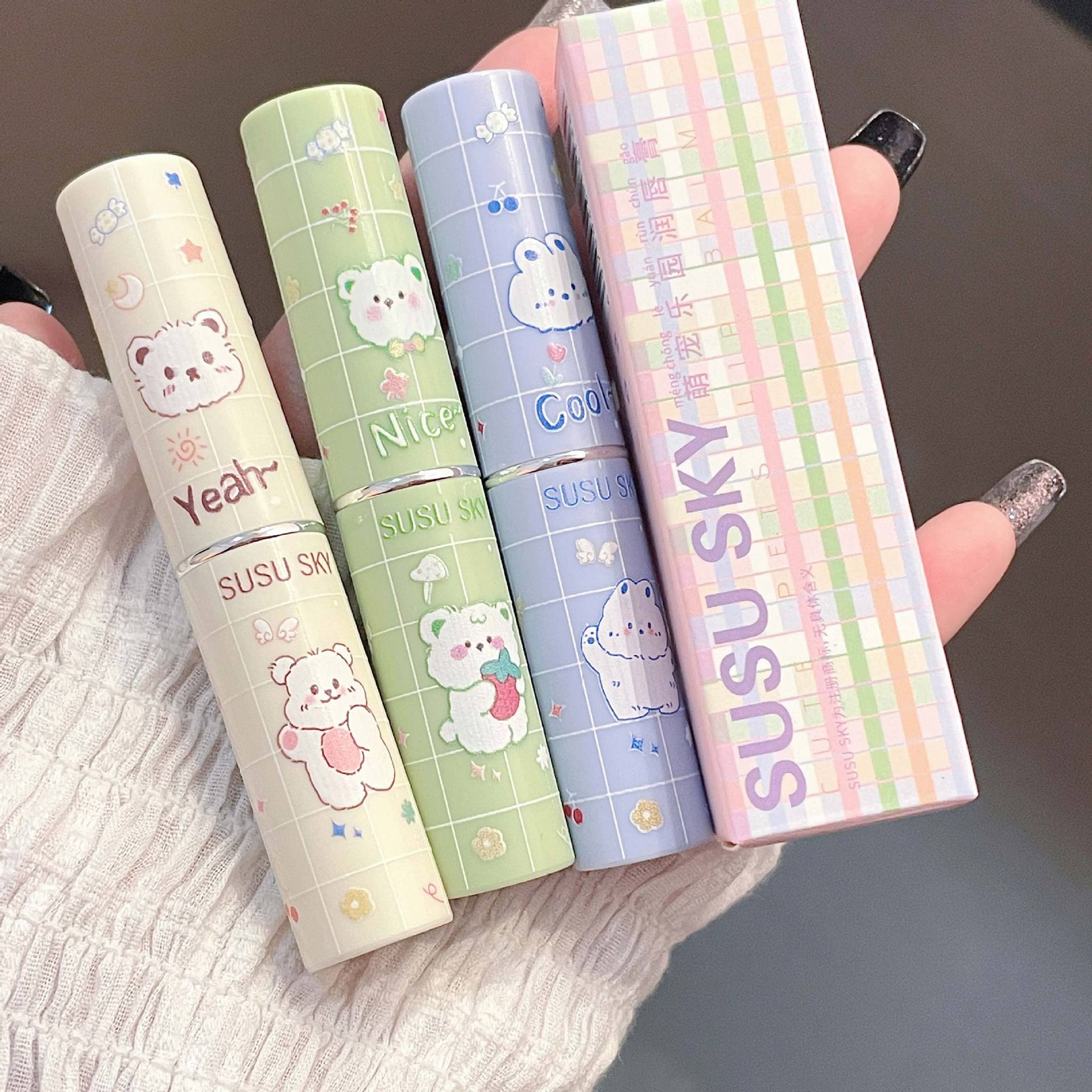 SUSU SKY Pet Paradise's colored lip balm repairs, moisturizes and brightening the complexion. The sweet and chubby lips are affordable for girls undefined