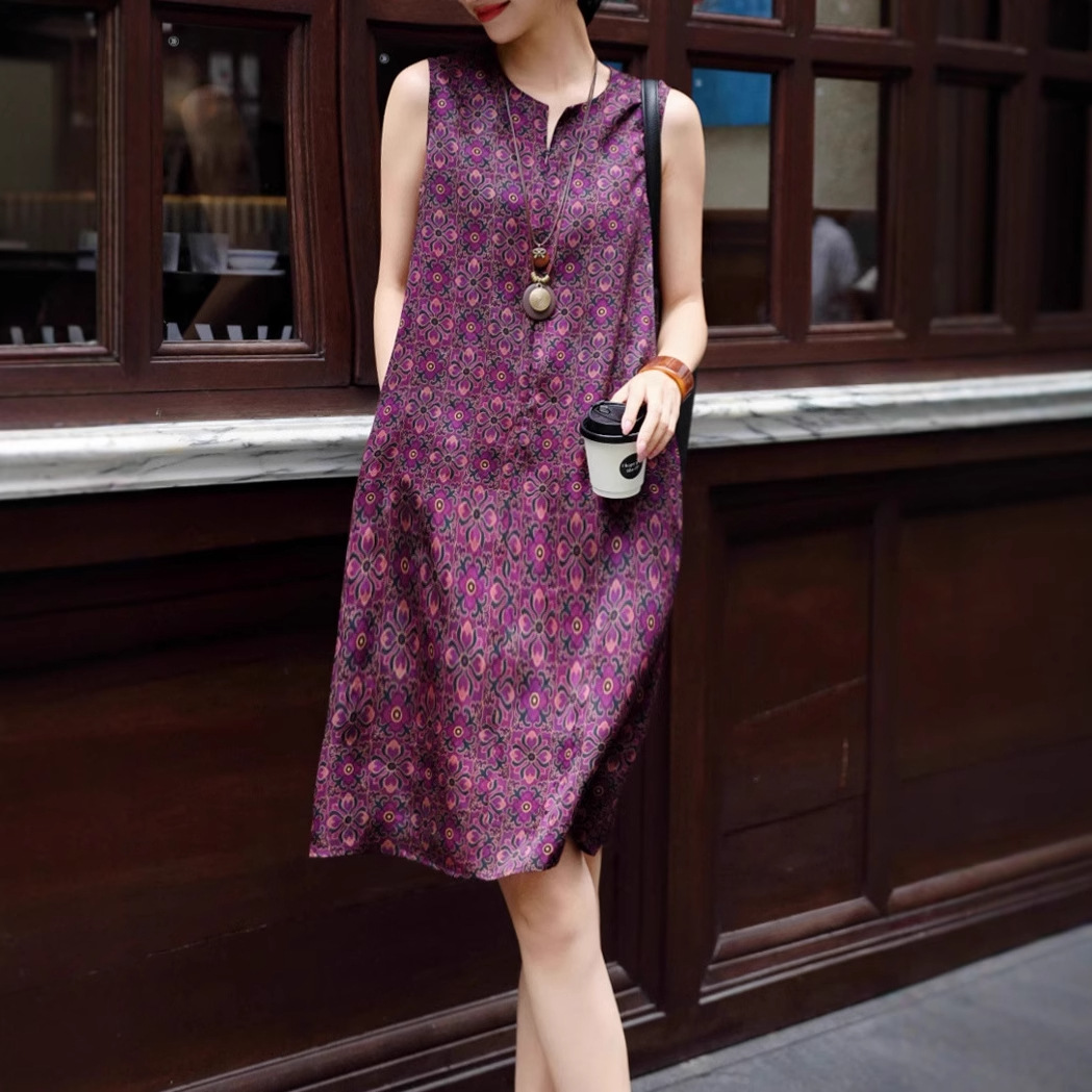 Silk summer dress with a round collar sleevless