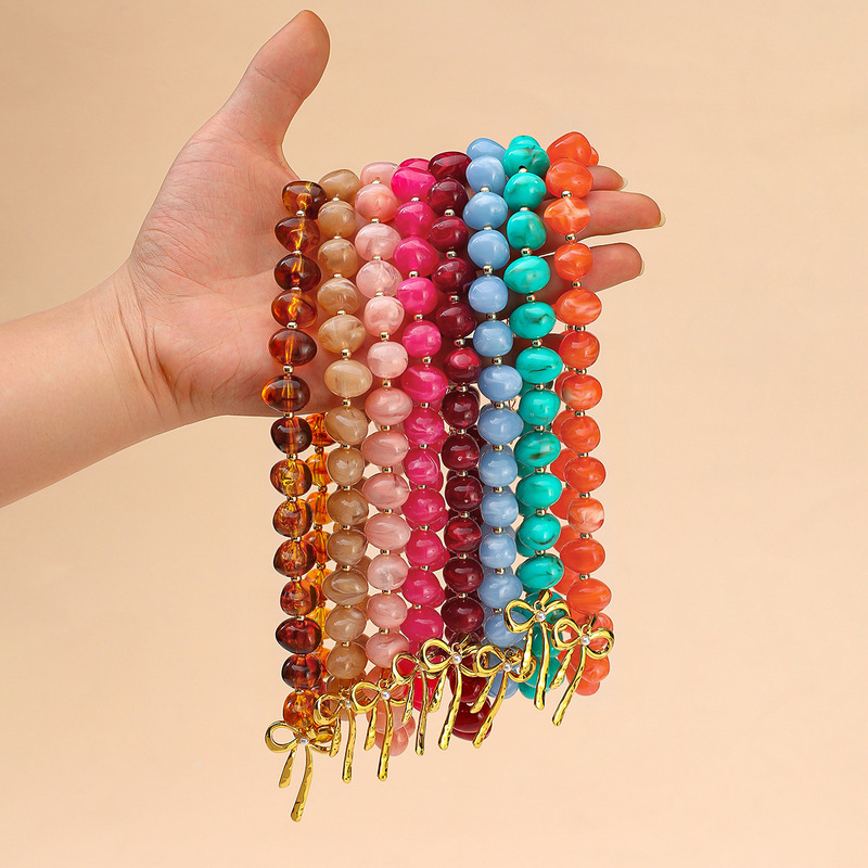 European and American New Acrylic Beaded Necklace with Stainless Steel Bow Pendant, Exquisite and Versatile Designer Style for Women