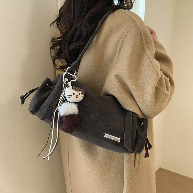 Coreano Maillard nicho bolsas de perros calientes retro mate bolsas de hombro para mujeres 2025 nueva bolsa de viaje