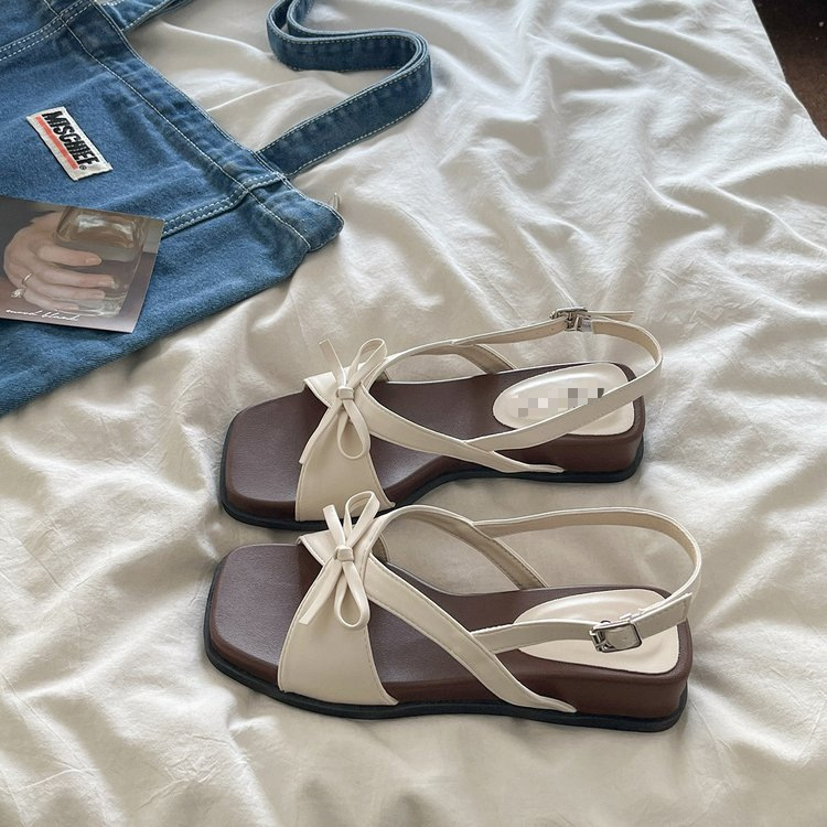 Hermosas sandalias para mujeres 2026 verano nuevo arco pendiente talón grueso no se cansará de los pies traseros sandálias de playa