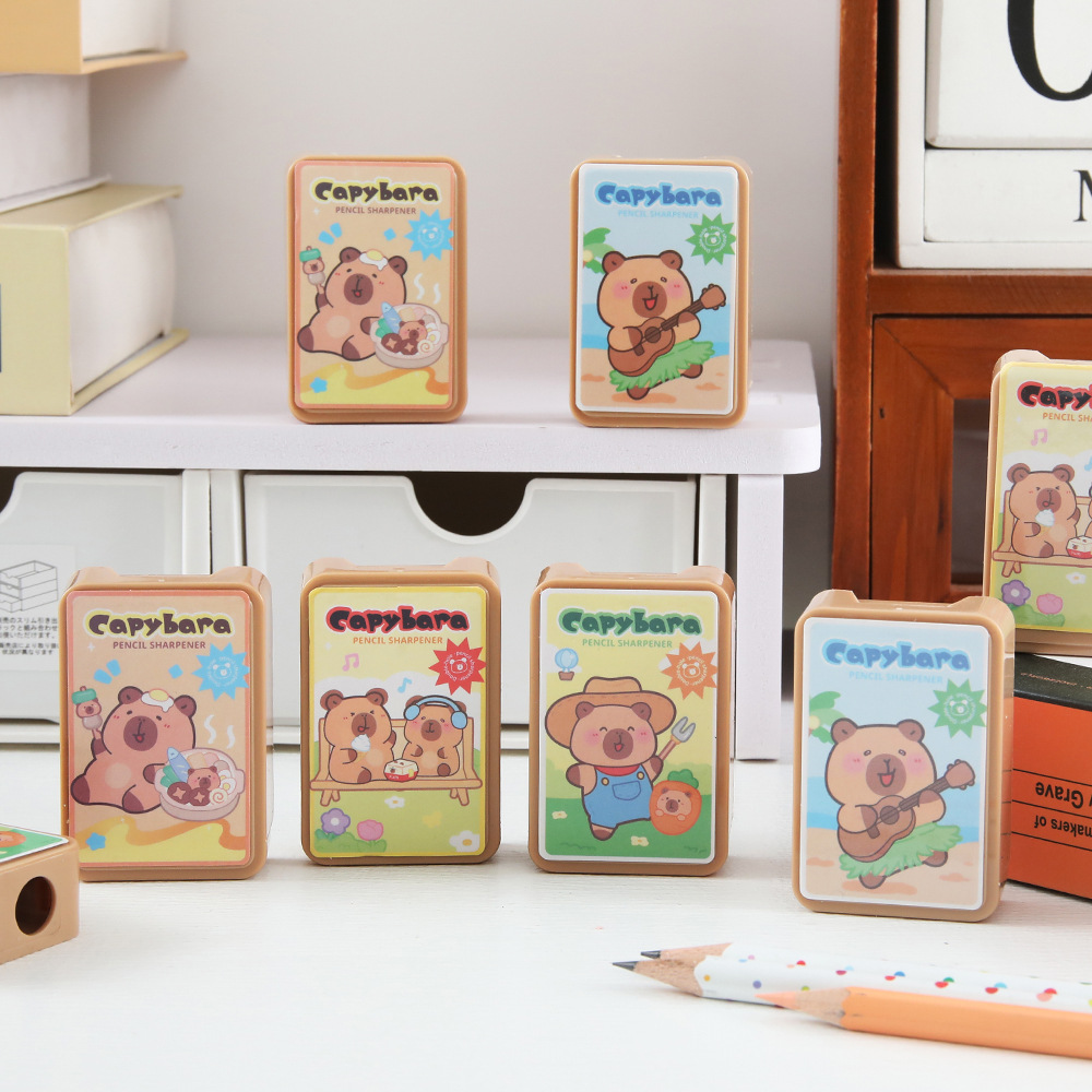 Capibala de doble agujero cuchillo de lápiz dibujos animados dibujo de lápiz cuchillo de transferencia de alto valor facial para estudiantes de primaria artículos de papelería